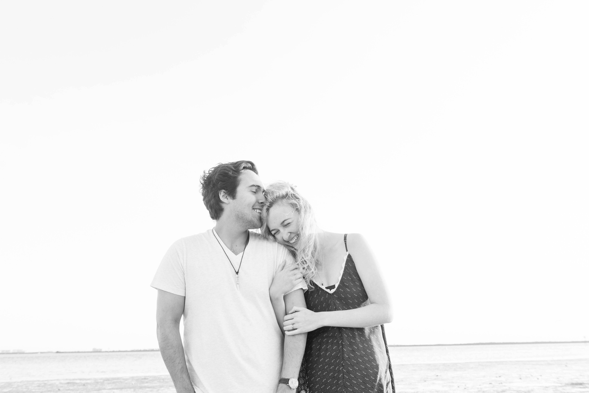 Playful Sunset Florida Couple Session , what to wear for engagement pictures, beach engagement pictures