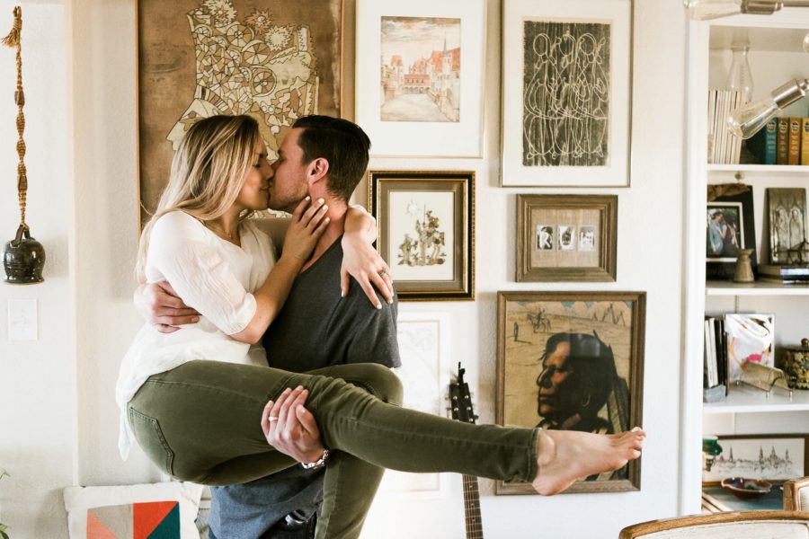 man holding woman while kissing, Romantic in Home Anniversary Session