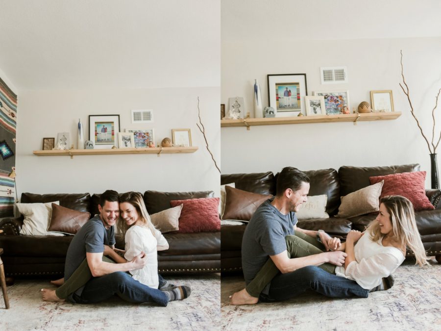 couple sitting on floor laughing, Romantic in Home Anniversary Session