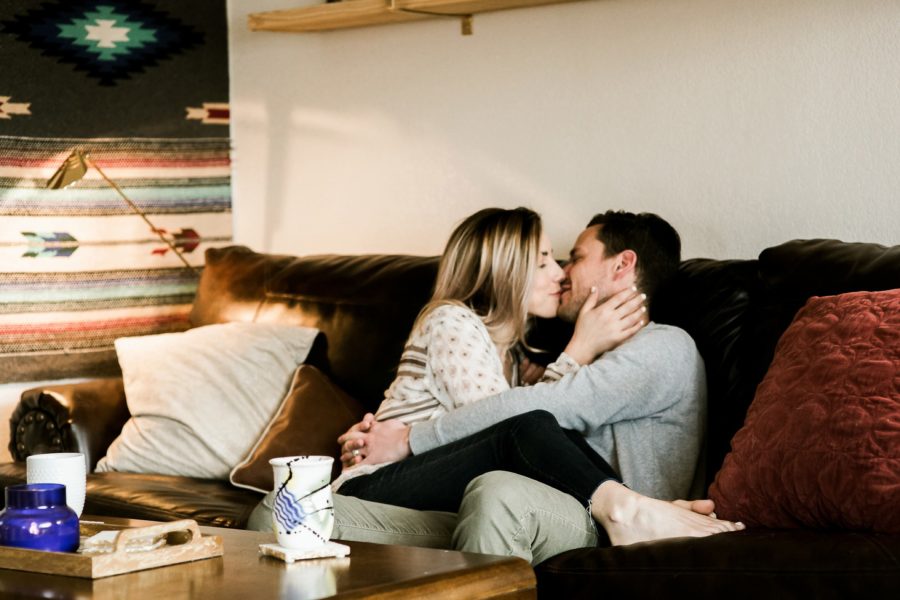 couple cuddling on couch, Romantic in Home Anniversary Session