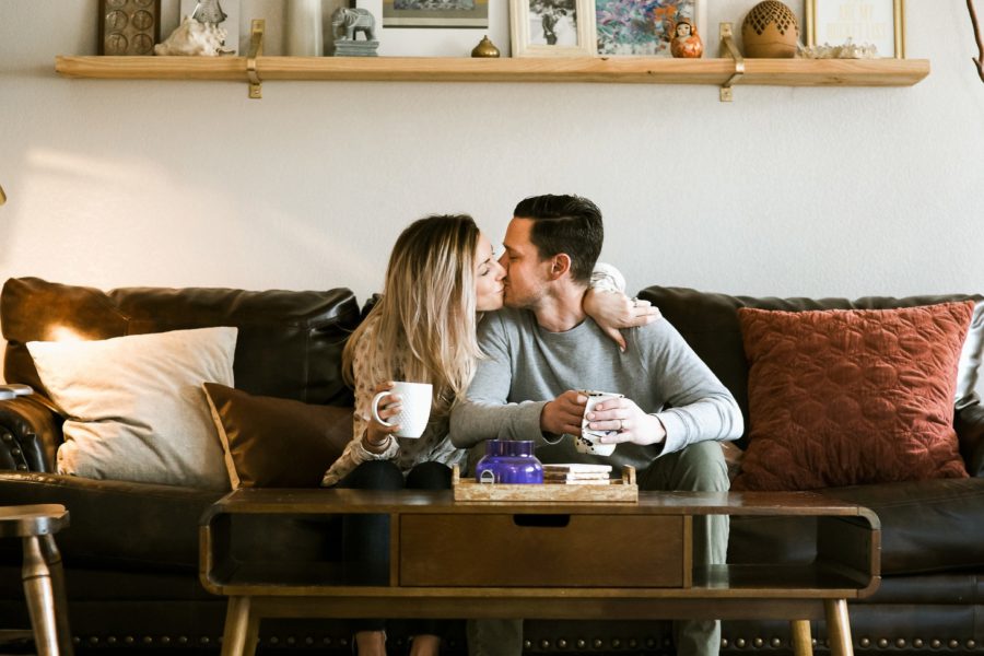 couple drinking coffee and kissing, Romantic in Home Anniversary Session