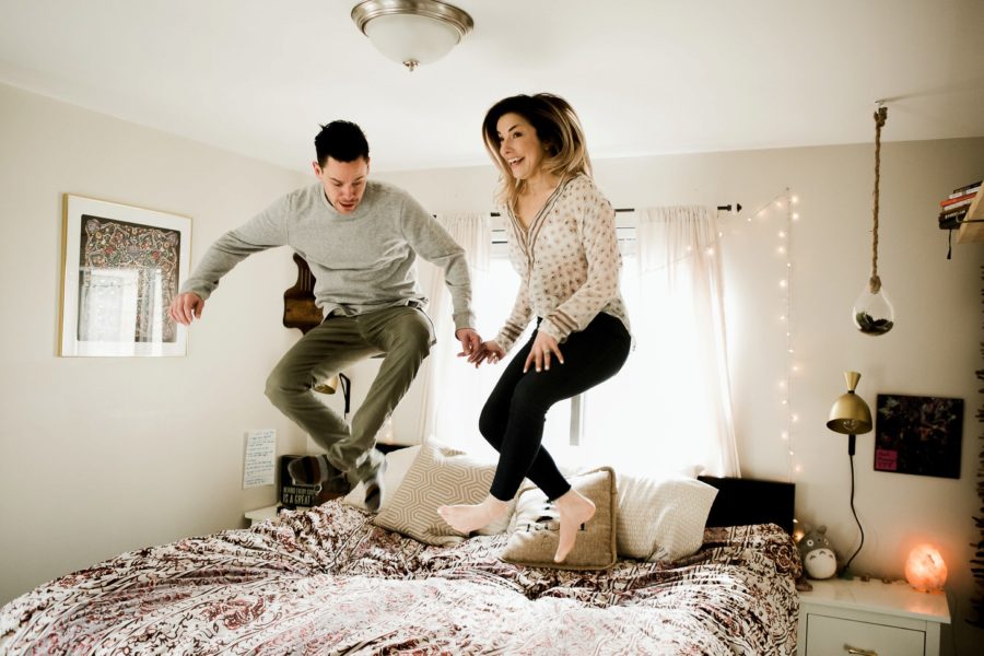 couple jumping on bed, Romantic in Home Anniversary Session