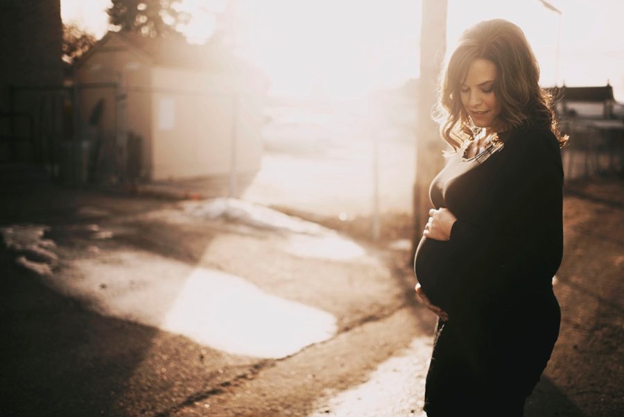 sunset maternity pose, Downtown Alley Maternity Session in Colorado 