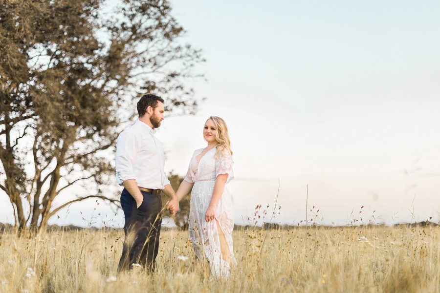 Couple in field, film engagement pictures, Dreamy Sunset Anniversary Pictures in Texas, Inspirational Photography Blog 