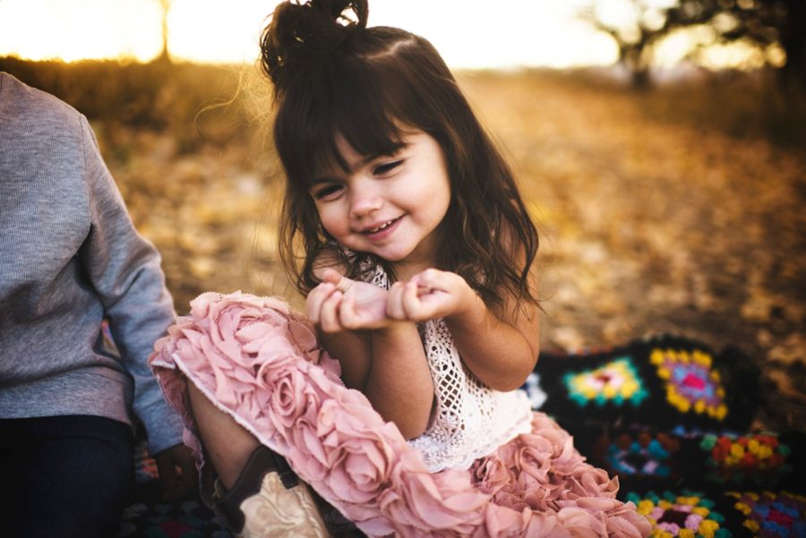 little girl laughing, Sunset Family Pictures in Colorado