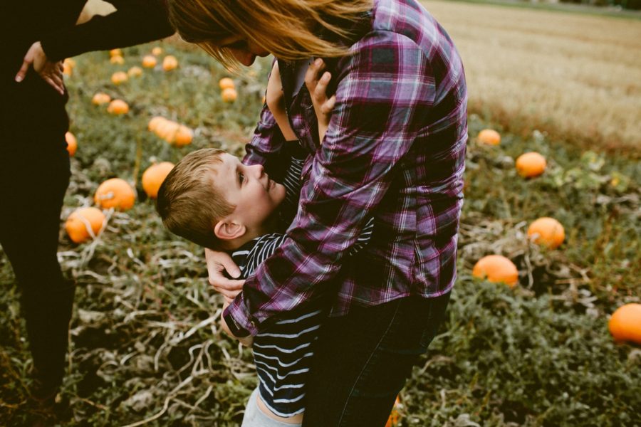 mom and son cuddling, lifestyle photography, Family Pumpkin Patch Adventure in British Columbia