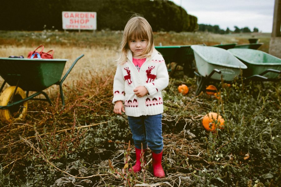 little girl at pumpkin patch, lifestyle photography, Family Pumpkin Patch Adventure in British Columbia