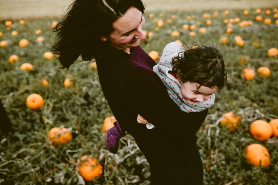 mom playing with daughter, lifestyle photography, Family Pumpkin Patch Adventure in British Columbia