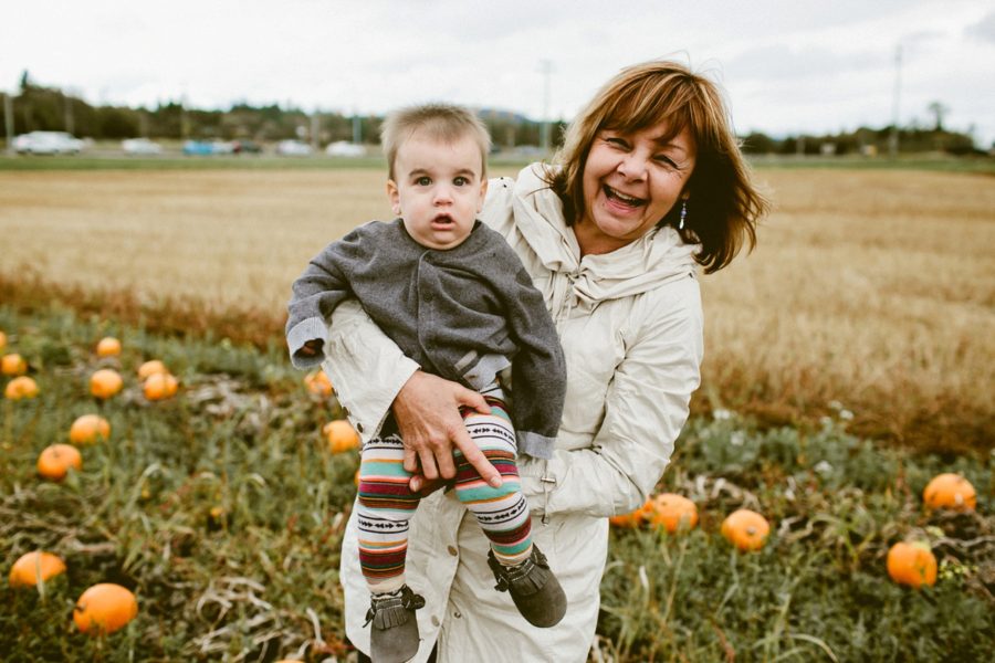 grandma holding grandson, lifestyle photography, Family Pumpkin Patch Adventure in British Columbia