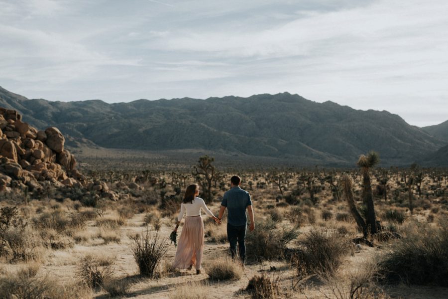 man and woman walking in desert, Moody Couples Session at Joshua Tree