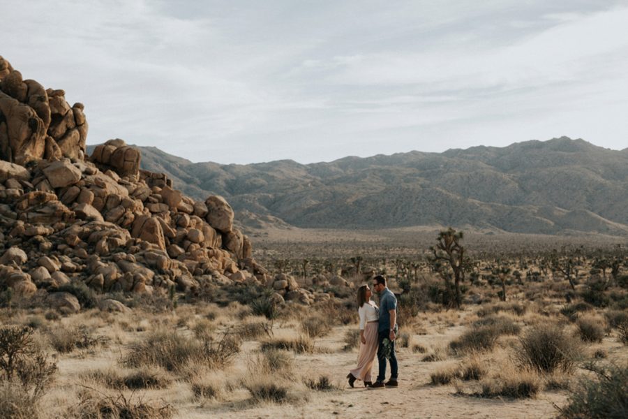 engagement pose in desert, Moody Couples Session at Joshua Tree