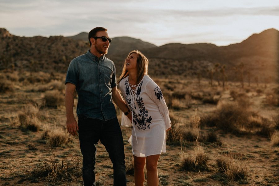 woman laughing with man, engagements at sunset, Moody Couples Session at Joshua Tree