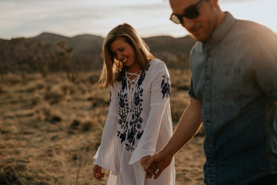 beautiful engagement pictures, woman smiling, couple holding hands, Moody Couples Session at Joshua Tree