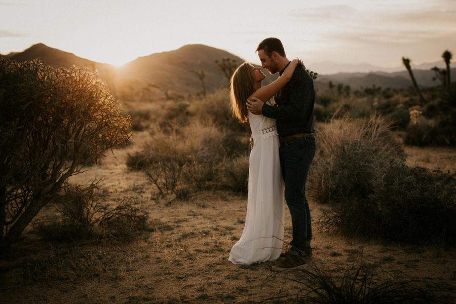 man and woman gazing in to eyes, Moody Couples Session at Joshua Tree
