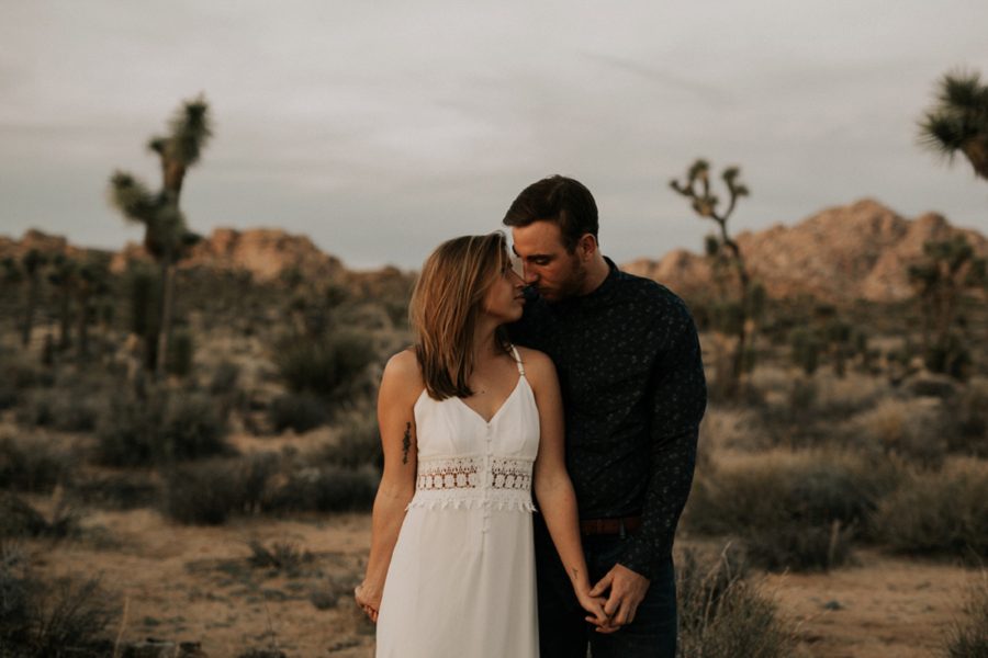 couple posing in desert, tasteful tattoo, Moody Couples Session at Joshua Tree