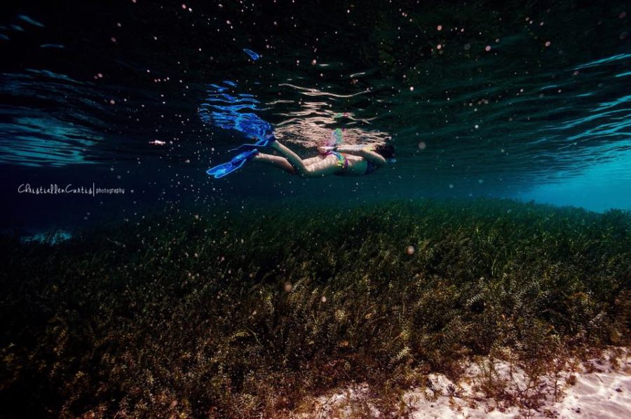 girl swimming, child snorkeling, underwater photography