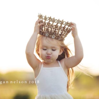 Girl putting crown on, little girl with windblown hair, Daily Fan favorite on Beyond the Wanderlust