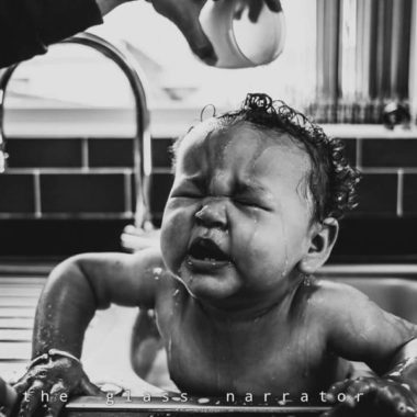 Baby getting water poured over head, sink bath, Daily Fan Favorite on Beyond the Wanderlust by The Glass Narrator