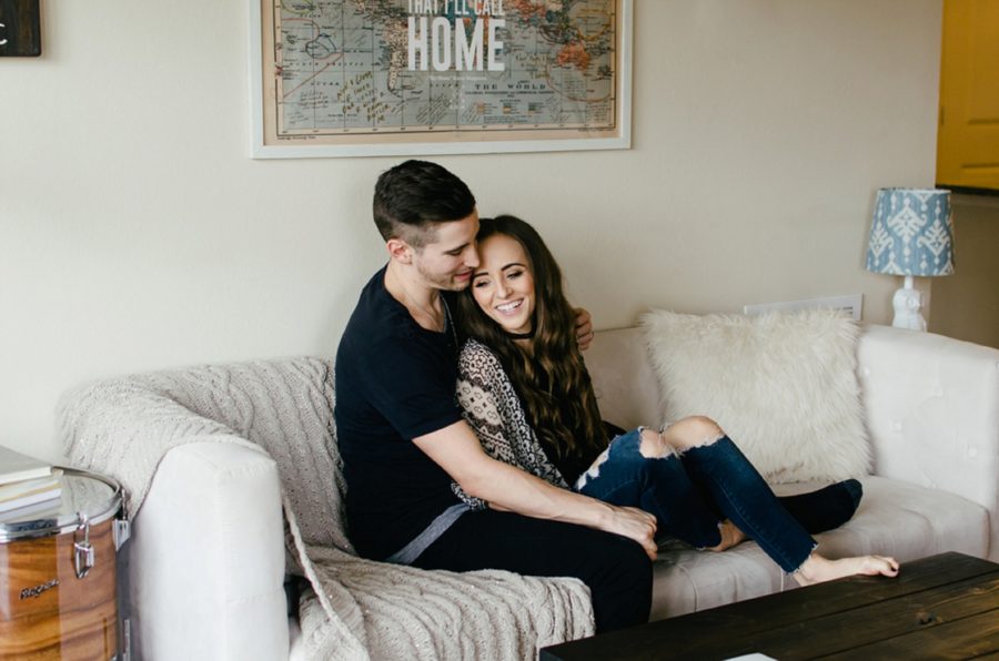 Man and woman snuggled up on couch together, Nashville Lifestyle Couples Session