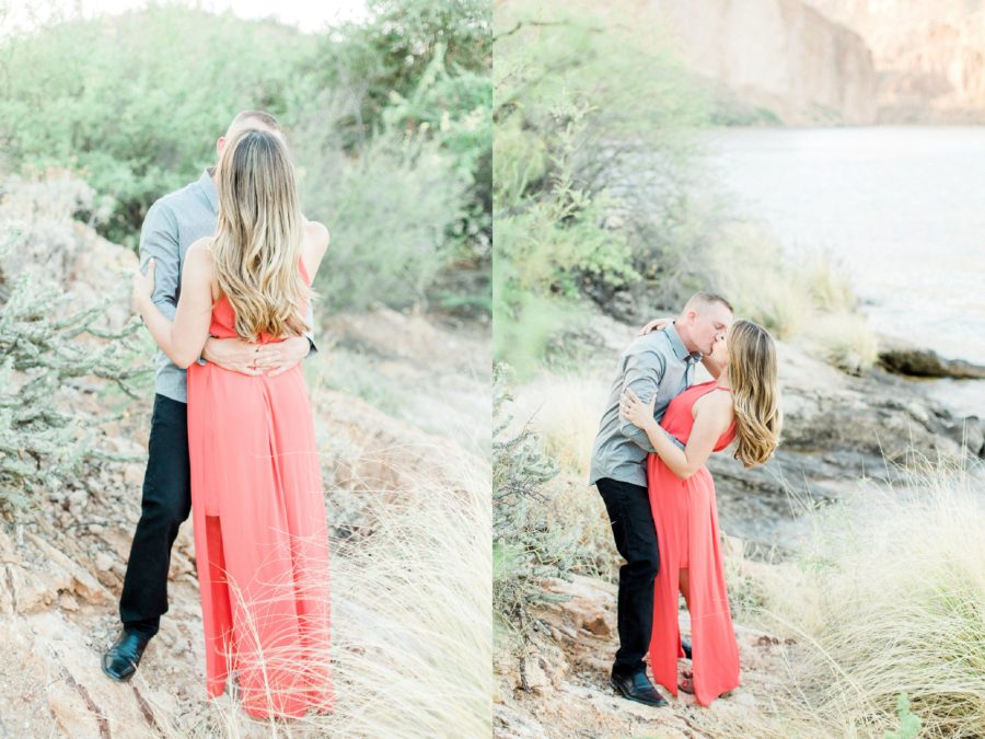 Man and woman kissing by lake shore, Man dipping woman back for kiss, Canyon Lake Engagement Pictures in Arizona