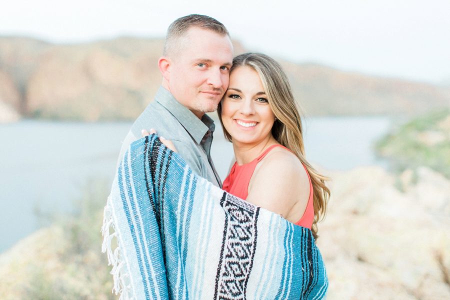Couple wrapped in blanket together, Canyon Lake Engagement Pictures in Arizona
