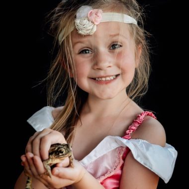 Girl dressed as princess holding frog, Chani Gunn Photography Daily Fan Favorite