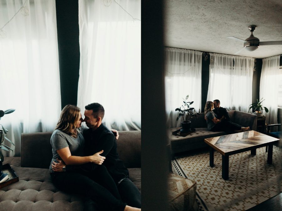 Couple snuggling on couch together, wooden chevron pattern coffee table, In-Home Couples Session to Announce Adoption