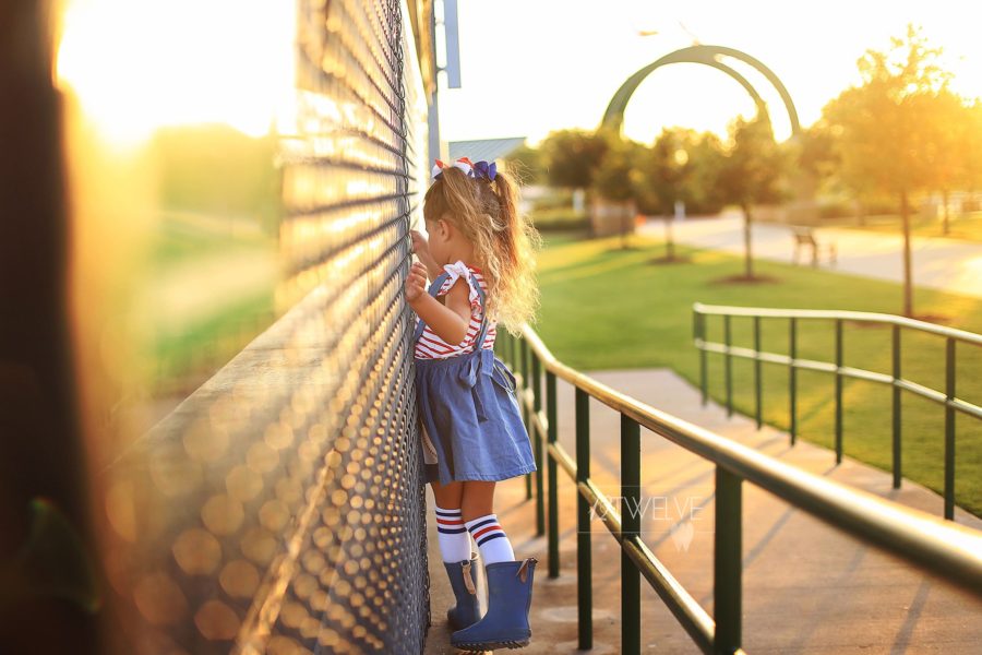Girl dressed in red white and blue at golden hour, 12Twelve Photography Daily Fan Favorite