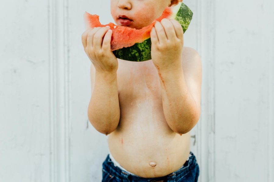 Watermelon juice dripping down child, Beyond the Wanderlust Daily Fan Favorite