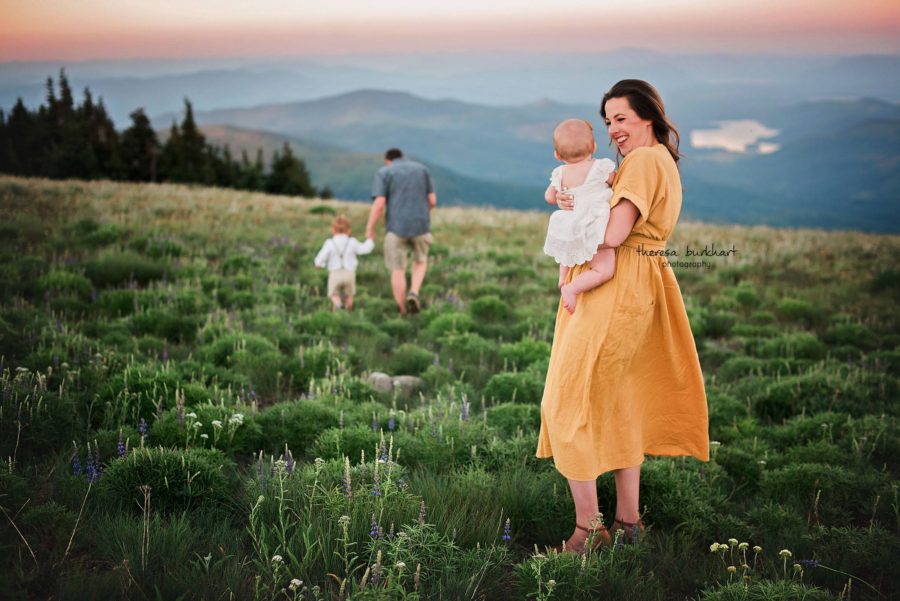 family walking in grass with mountains behind, Theresa Burkhart Photography Daily Fan Favorite