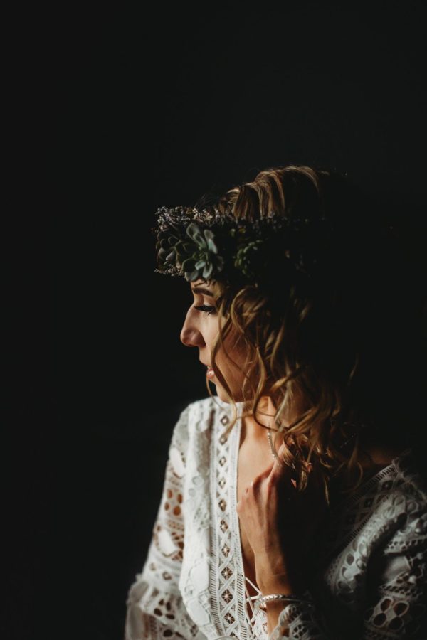 Side lit portrait of woman with black background, Beyond the Wanderlust Daily Fan Favorites