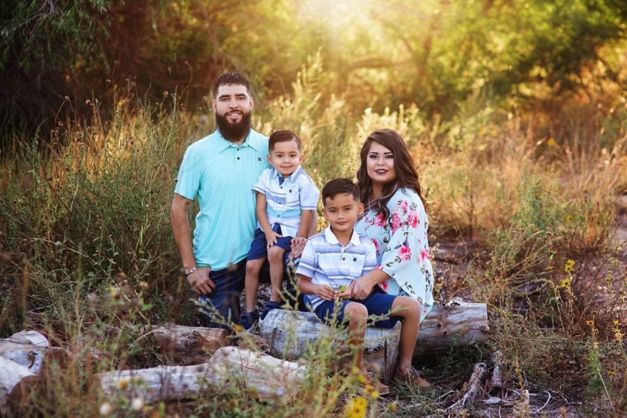 Family portrait mom and son sitting on cut log, Beyond the Wanderlust Daily Fan Favorite