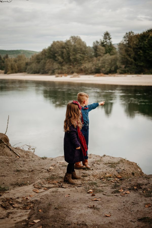Kids standing on dirt river bank pointing across, Sweet E Photography Daily Fan Favorite